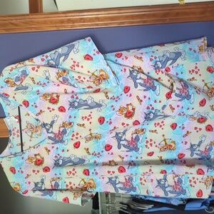 Women's Tom and Jerry scrub top.